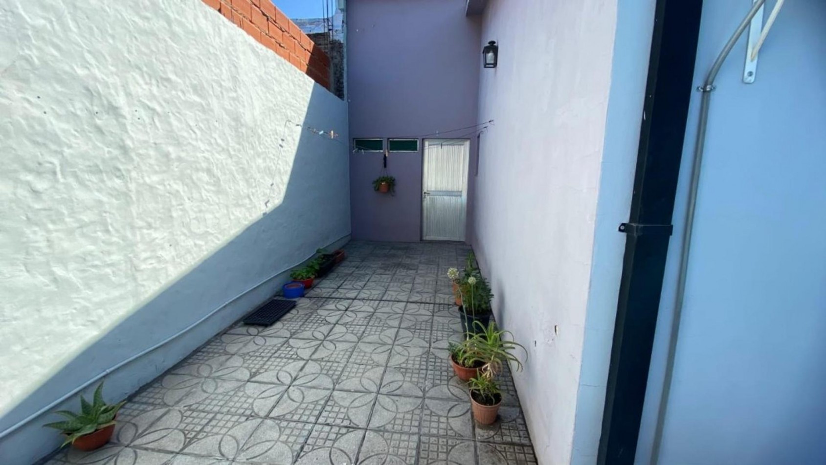 VENTA CASA 3 AMBIENTES CON PATIO Y PILETA BELLA VISTA